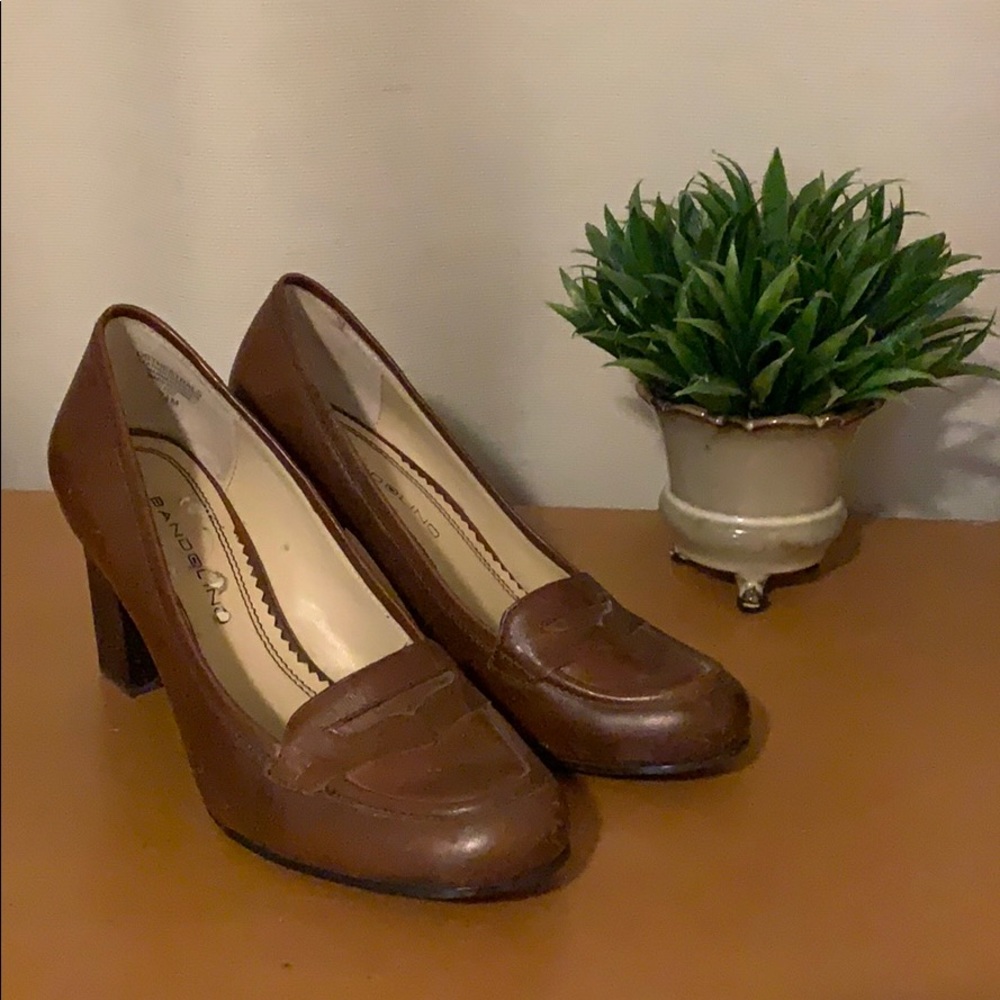 Brown heeled loafers.